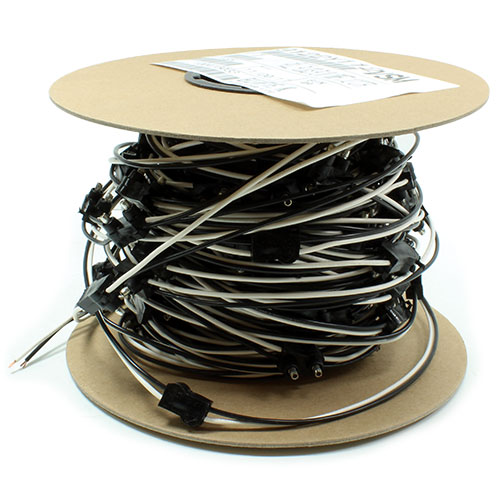 coiled harness with 100 VSM9122 2-prong plugs mounted on 6-inch centers.